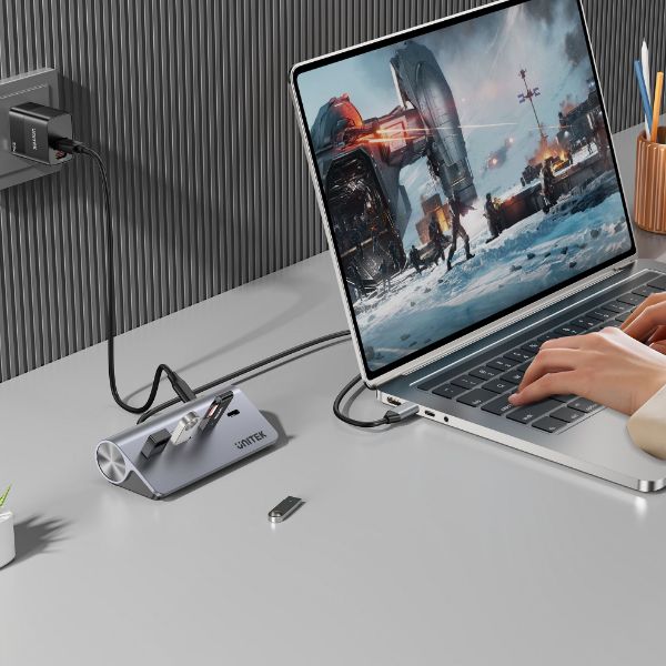 Picture of 4-in-1 Multi-Port Hub w/ USB-C Connector. 2x USB-C 2x USB-A Ports. Supports 5Gbps